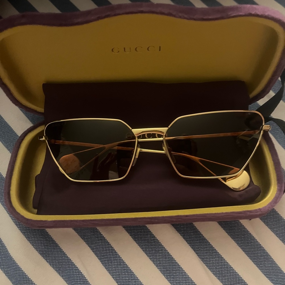 Gucci Black and Gold Sunglasses